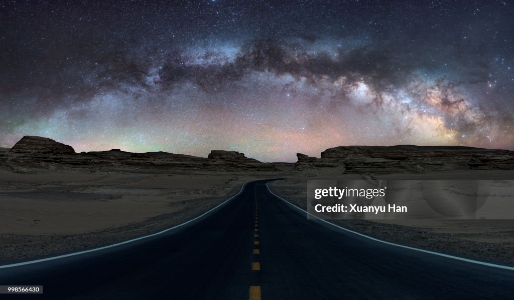 Road under the milky way