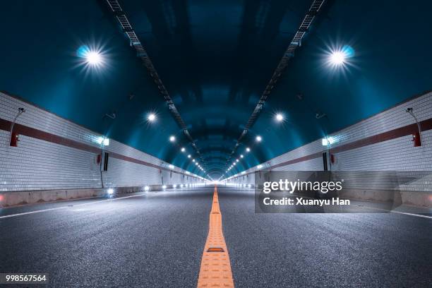 modern highway tunnel underpass - túnel de carretera fotografías e imágenes de stock