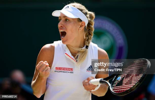 Angelique Kerber of Germany celebrates after beating Jelena Ostapenko of Latvia in the ladies' semi finals at the All England Lawn Tennis and Croquet...