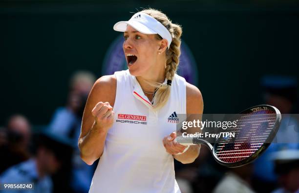 Angelique Kerber of Germany celebrates after beating Jelena Ostapenko of Latvia in the ladies' semi finals at the All England Lawn Tennis and Croquet...