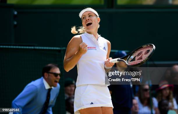 Angelique Kerber of Germany celebrates after beating Jelena Ostapenko of Latvia in the ladies' semi finals at the All England Lawn Tennis and Croquet...