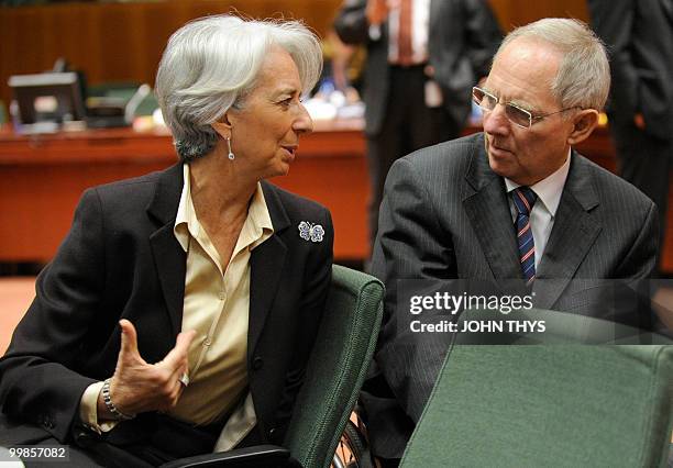 France's Finance Minister Christine Lagarde talks with German Finance Minister Wolfgang Schaeuble prior to an Economic and Financial Affairs Council...