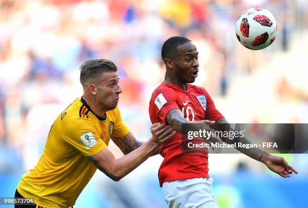 Raheem Sterling of England wins a header over Toby Alderweireld of Belgium during the 2018 FIFA World Cup Russia 3rd Place Playoff match between...