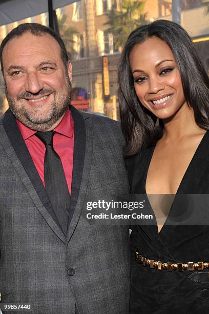 Producer Joel Silver and actress Zoe Saldana arrive at "The Losers" Premiere at Grauman�s Chinese Theatre on April 20, 2010 in Hollywood, California.