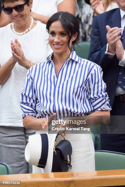 Meghan, Duchess of Sussex attends day twelve of the Wimbledon Tennis Championships at the All England Lawn Tennis and Croquet Club on July 13, 2018...