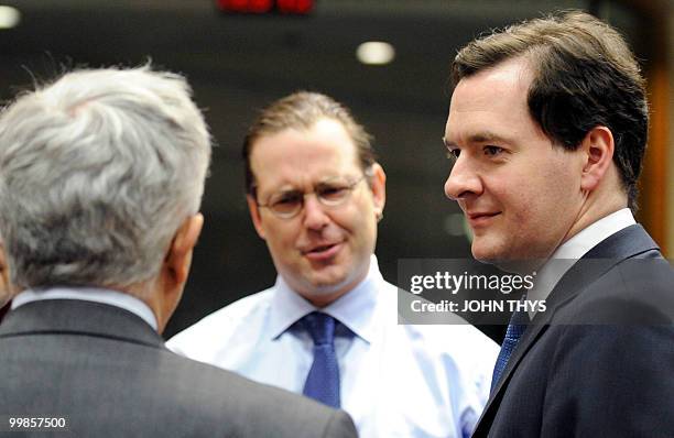 Italian Finance Minister Giulio Tremonti talks with British Chancellor of the Exchequer, George Osborne and Swedish Finance Minister Anders Borg...