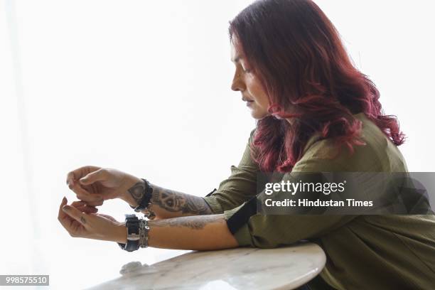 Bollywood director, actor and film maker Pooja Bhatt poses during an exclusive interview with HT City-Hindustan Times, on July 7, 2018 in New Delhi,...