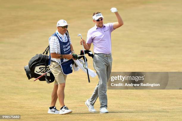 Ian Poulter of England talks to his caddy Terry Mundy on hole four during day three of the Aberdeen Standard Investments Scottish Open at Gullane...