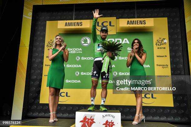 Slovakia's Peter Sagan, wearing the best sprinter's green jersey, celebrates on the podium after the eighth stage of the 105th edition of the Tour de...