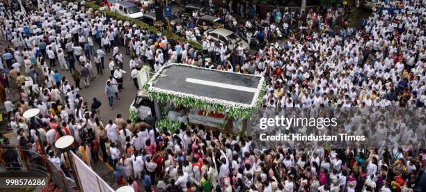 Thousand of people gather behind the funeral procession of Dada JP Vaswani at Sadhu Vaswani Mission, on July 13, 2018 in Pune, India. Dada Vaswani...