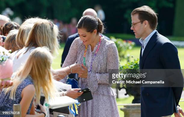 Crown Princess Victoria of Sweden and Prince Daniel of Sweden with wellwishers during the occasion of The Crown Princess Victoria of Sweden's 41st...
