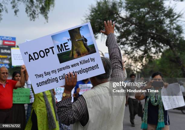 Over 150 environmentally conscious citizens came out to Atul Kataria Chowk to protest against tree-fallings and make their voice heard in the...