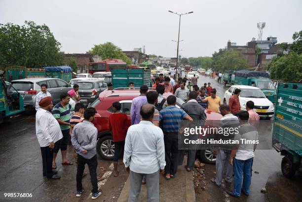 Massive traffic jam after heavy rainfall results in water logging on Rohtak road, near Anand Parbat, on July 14, 2018 in New Delhi, India. The rains...