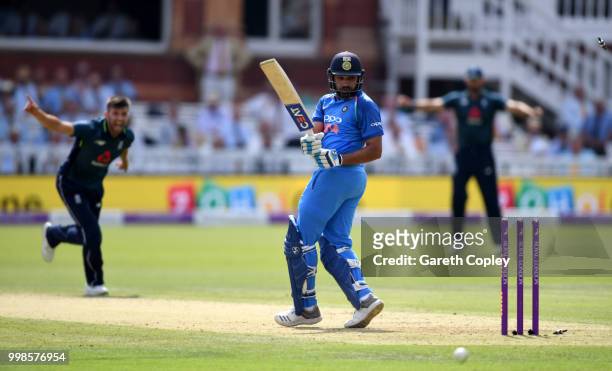 Rohit Sharma of India is bowled by Mark Wood of England during the 2nd ODI Royal London One-Day match between England and India at Lord's Cricket...