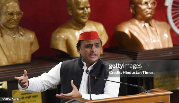 Samajwadi Party Chief Akhilesh Yadav addresses a press conference on 23,000-crore Purvanchal Express, at the party headquarters, on July 14, 2018 in...