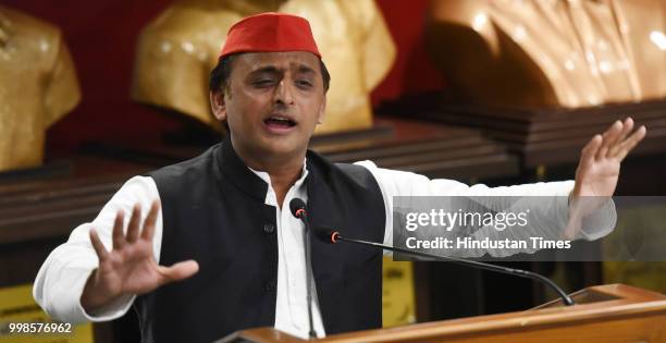 Samajwadi Party Chief Akhilesh Yadav addresses a press conference on 23,000-crore Purvanchal Express, at the party headquarters, on July 14, 2018 in...