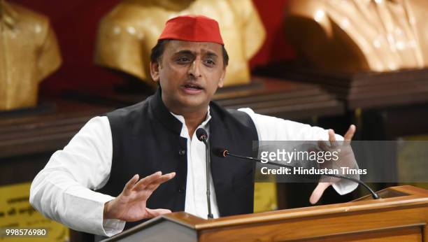 Samajwadi Party Chief Akhilesh Yadav addresses a press conference on 23,000-crore Purvanchal Express, at the party headquarters, on July 14, 2018 in...