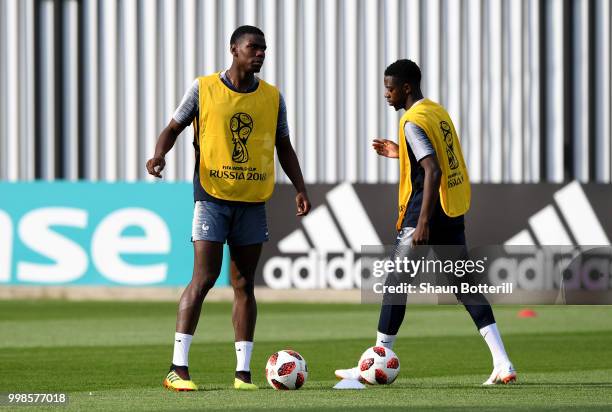 Paul Pogba and Ousmane Dembele of France in action during a France training session during the 2018 FIFA World Cup at Luzhniki Stadium on July 14,...