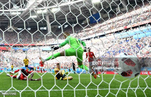 Thomas Meunier of Belgium scores his team's first goal past Jordan Pickford of England during the 2018 FIFA World Cup Russia 3rd Place Playoff match...