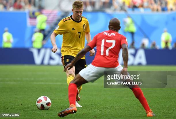 Belgium's midfielder Kevin De Bruyne fights for the ball with England's midfielder Fabian Delph during their Russia 2018 World Cup play-off for third...