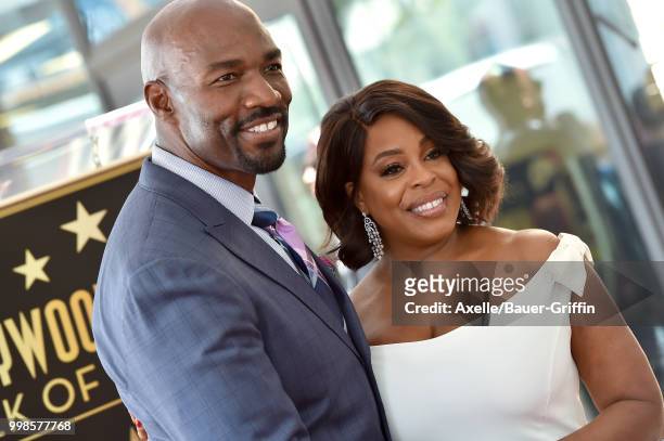 Actress Niecy Nash and husband Jay Tucker attend the ceremony honoring Niecy Nash with star on the Hollywood Walk of Fame on July 11, 2018 in...