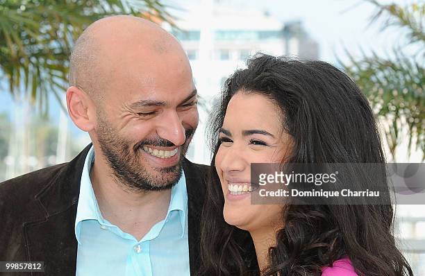 Actors Farid Larbi and Sabrina Ouzani attend the 'Of Gods and Men' Photo Call held at the Palais des Festivals during the 63rd Annual International...