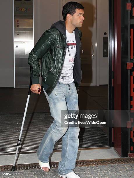 Michael Ballack, German National Football player, uses crutches leaving the practice of doctor Hans-Wilhelm Mueller-Wohlfahrt on May 17, 2010 in...