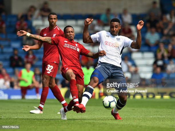 Nathaniel Clyne of Liverpool competes with Gold Omotayo of Bury during the Pre-Season friendly match between Bury and Liverpool at Gigg Lane on July...