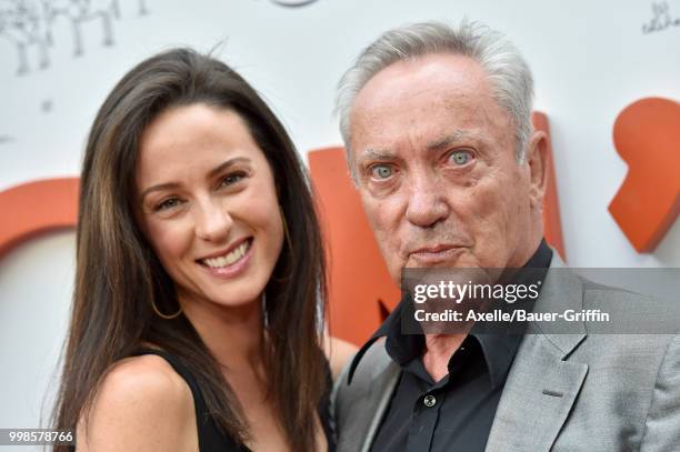 Actor Udo Kier and Charlotte Taschen arrive at Amazon Studios premiere of 'Don't Worry, He Won't Get Far on Foot' at ArcLight Hollywood on July 11,...