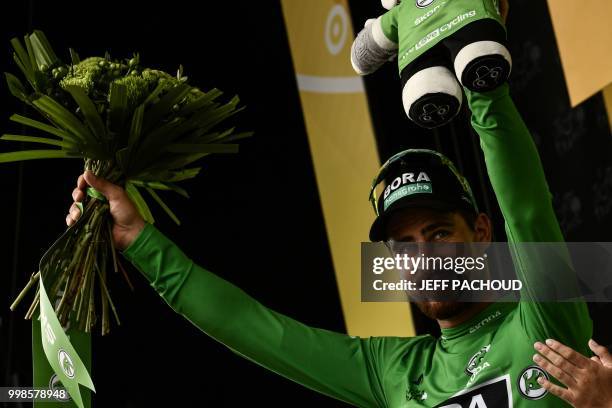 Slovakia's Peter Sagan, wearing the best sprinter's green jersey, celebrates on the podium after the eighth stage of the 105th edition of the Tour de...