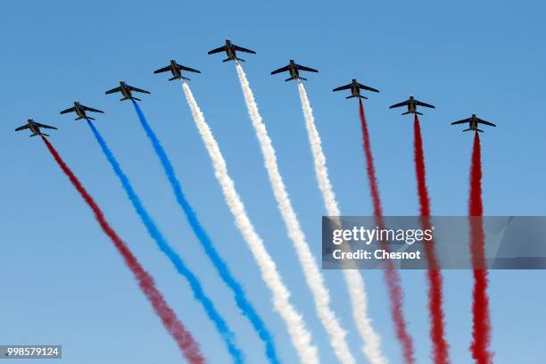 An error occurred in the colors of the French flag produced by the fumes of the 'Patrouille de France during the traditional Bastille Day military...