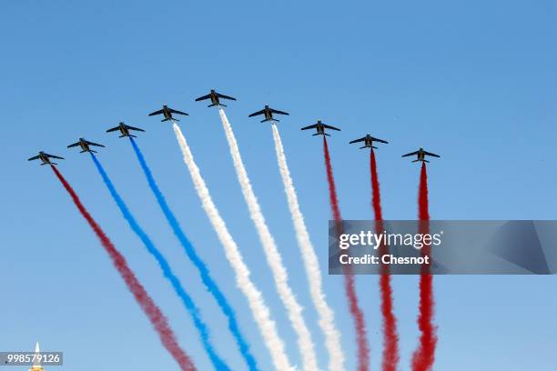 An error occurred in the colors of the French flag produced by the fumes of the 'Patrouille de France during the traditional Bastille Day military...