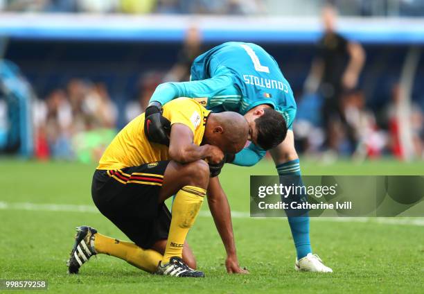 Thibaut Courtois of Belgium checks on teammate Vincent Kompany of Belgium who goes down injured during the 2018 FIFA World Cup Russia 3rd Place...