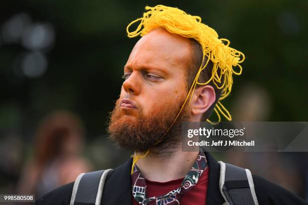 Protesters wear orange face makeup while the U.S. President is visiting Trump Turnberry Luxury Collection Resort in Scotland as people gather for...