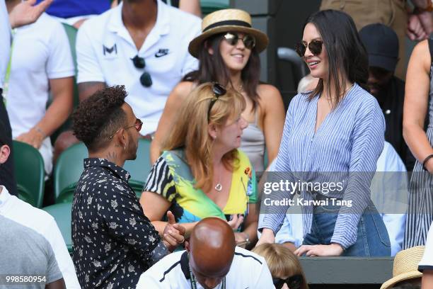 Lewis Hamilton and Olivia Munn attend day twelve of the Wimbledon Tennis Championships at the All England Lawn Tennis and Croquet Club on July 13,...