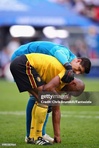 Thibaut Courtois of Belgium talks with teammate Vincent Kompany during the 2018 FIFA World Cup Russia 3rd Place Playoff match between Belgium and...