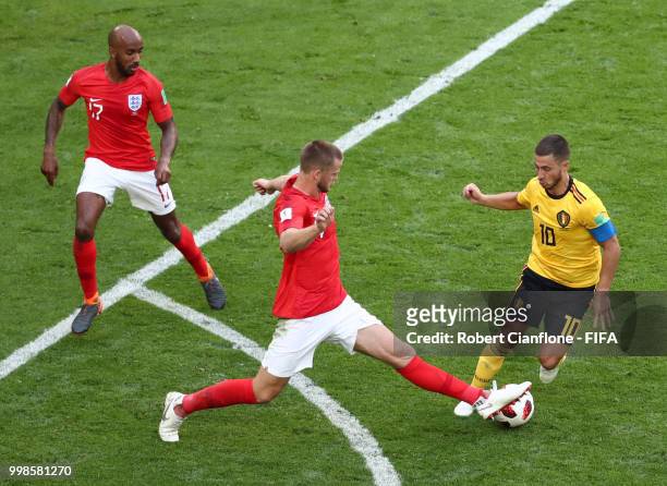 Eric Dier of England tackles Eden Hazard of Belgium during the 2018 FIFA World Cup Russia 3rd Place Playoff match between Belgium and England at...