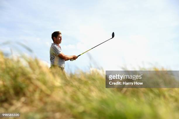 Robert Rock of England takes his tee shot on hole two during day three of the Aberdeen Standard Investments Scottish Open at Gullane Golf Course on...