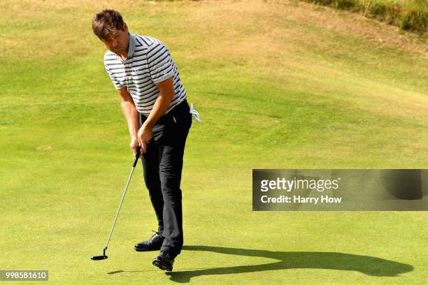 Robert Rock of England reacts to a missed par putt on hole one during day three of the Aberdeen Standard Investments Scottish Open at Gullane Golf...