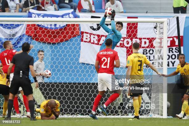 Referee Alireza Faghani, Vincent Kompany of Belgium, Ruben Loftus-Cheek of England, Belgium goalkeeper Thibaut Courtois , Thomas Vermaelen of...