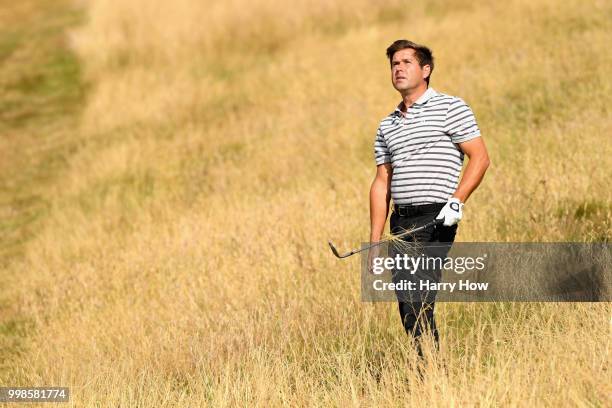 Robert Rock of England plays out of the rough on hole one during day three of the Aberdeen Standard Investments Scottish Open at Gullane Golf Course...