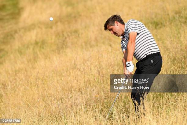 Robert Rock of England plays out of the rough on hole one during day three of the Aberdeen Standard Investments Scottish Open at Gullane Golf Course...