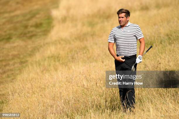 Robert Rock of England plays out of the rough on hole one during day three of the Aberdeen Standard Investments Scottish Open at Gullane Golf Course...