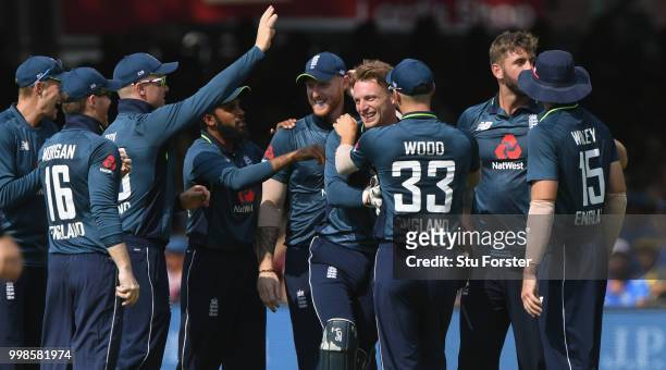 England players rush to congratulate Jos Buttler after he had caught Rahul off Liam Plunkett during the 2nd ODI Royal London One Day International...