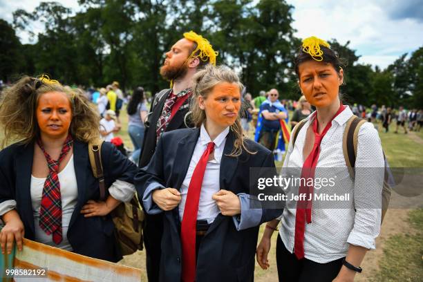 Protesters wear orange face makeup while the U.S. President is visiting Trump Turnberry Luxury Collection Resort in Scotland as people gather for...