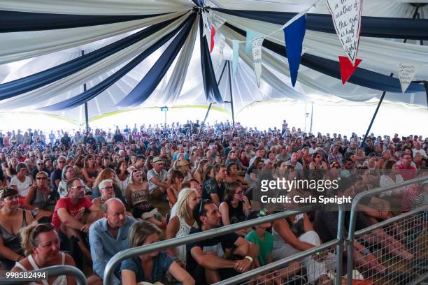 Speak Easy stage crowd watch Russell Kane's Evil Genius Live during Latitude Festival at Henham Park Estate on July 14, 2018 in Southwold, England.