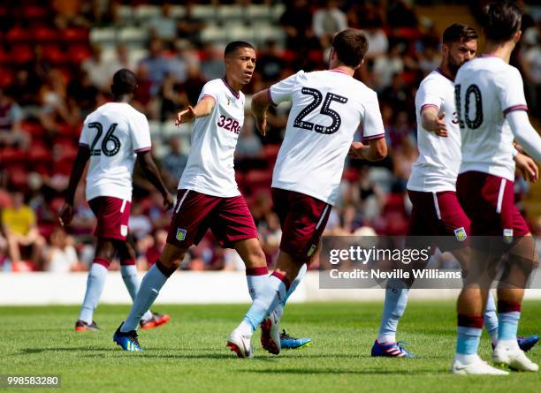 Harvey Knibbs of Aston Villa scores for Aston Villa during the Pre-Season Friendly match between Kidderminster Harriers and Aston Villa at the...