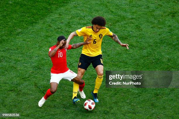 England v Belgium - Play off for third place final FIFA World Cup Russia 2018 Raheem Sterling and Alex Witsel at Saint Petersburg Stadium in Russia...