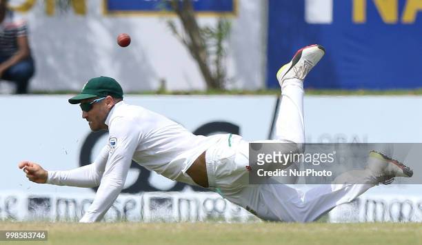 South African cricket captain Faf Du Plessis fails to hold on to a catch during the 3rd day's play in the first Test cricket match between Sri Lanka...