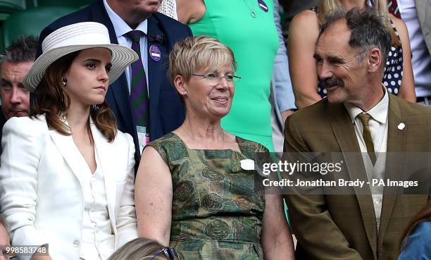 Emma Watson and Sir Mark and Lady Rylance in the royal box on centre court on day twelve of the Wimbledon Championships at the All England Lawn...
